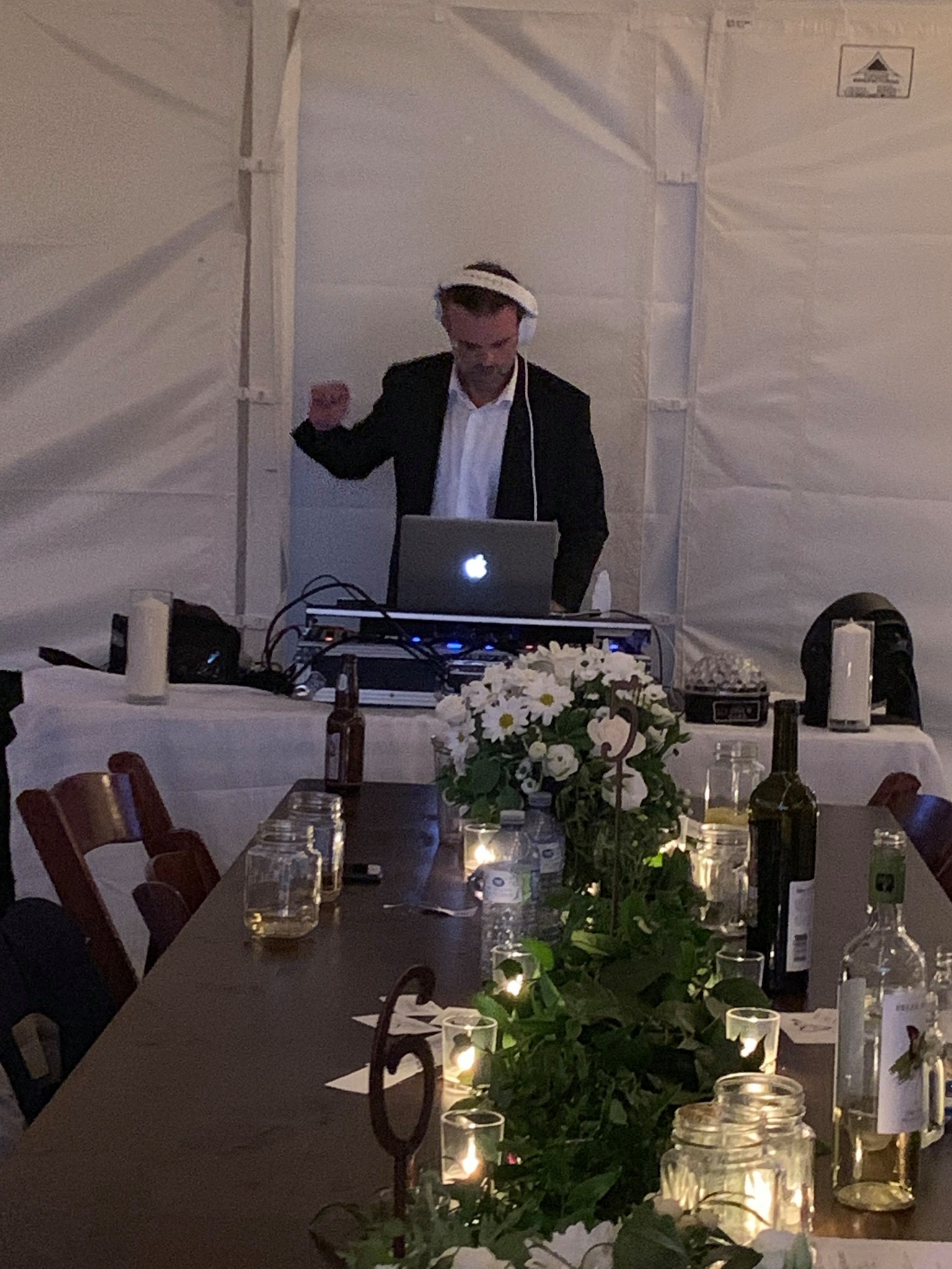Jason Brain - Professional Wedding DJ in action at an elegant tent wedding